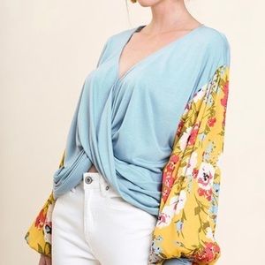Floral long puff sleeve cris cross top.